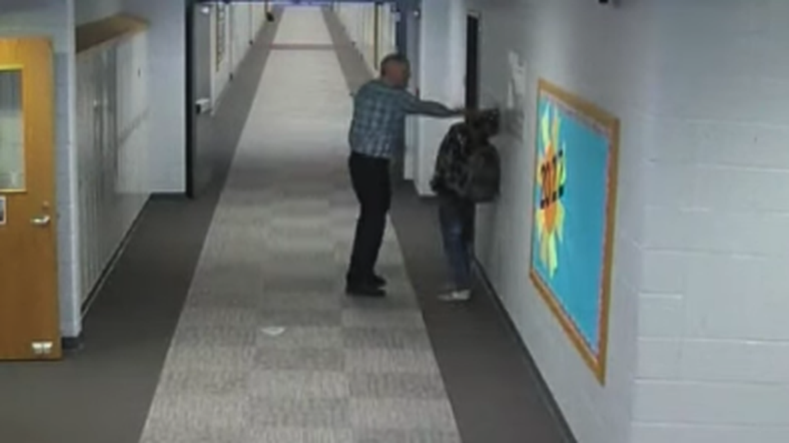 A teacher at Jimtown High School in Elkhart, Indiana, is shown slapping a student in security video.
