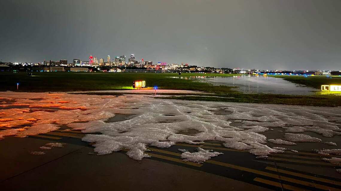 Snowplows in August at Kansas City downtown airport? What the hail