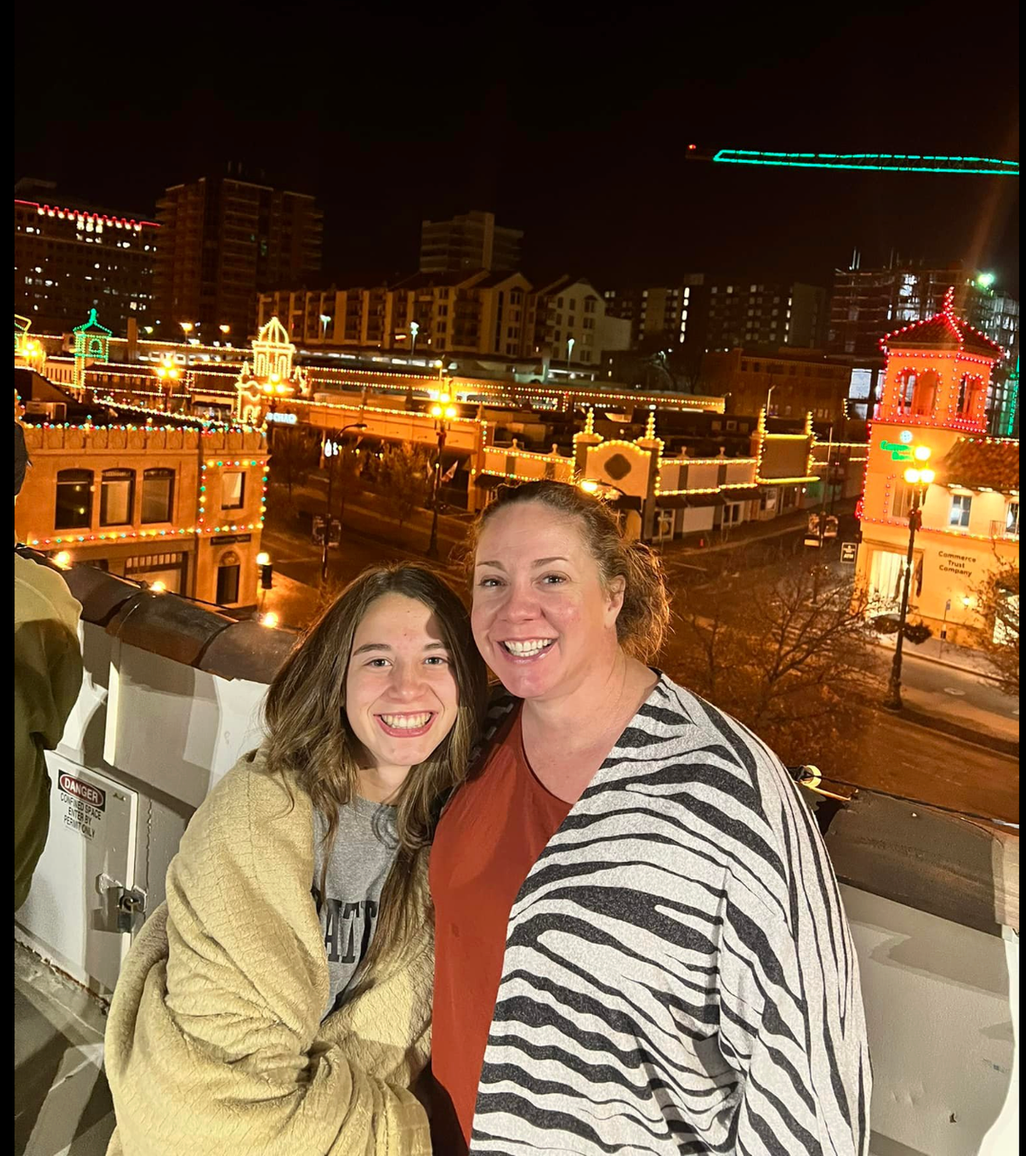 Jennifer West of Olathe, right, and her daughter, Camryn West, at a test run of the Country Club Plaza lights.