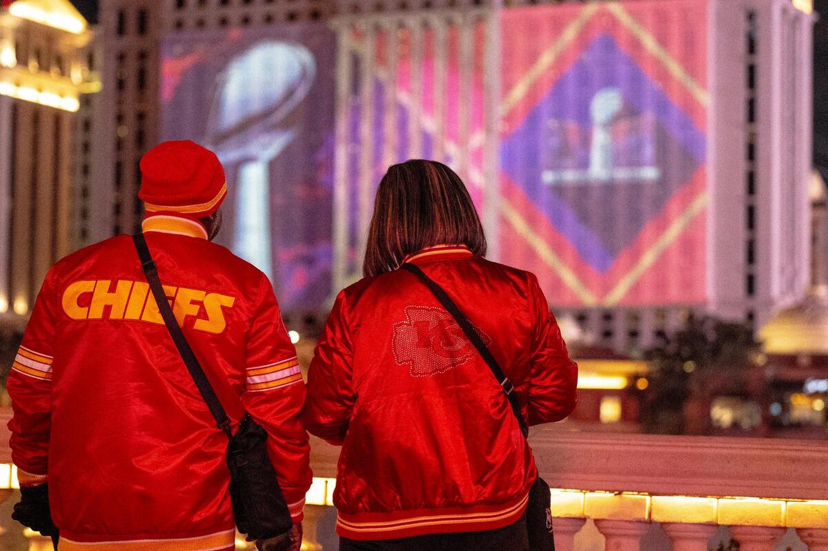 Frank Smocks, left, of Kansas City, watches the Bellagio fountains with his wife, Carla, on Thursday, Feb. 8, 2024, in Las Vegas, Nevada.