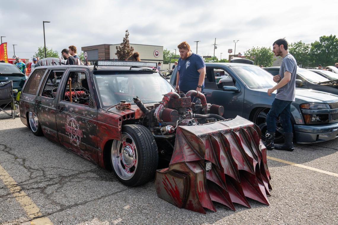 A station wagon that looks like it’s straight out of a zombie movie is eyed by attendees of the Kansas City stop of the Hot Wheels Legends Tour.