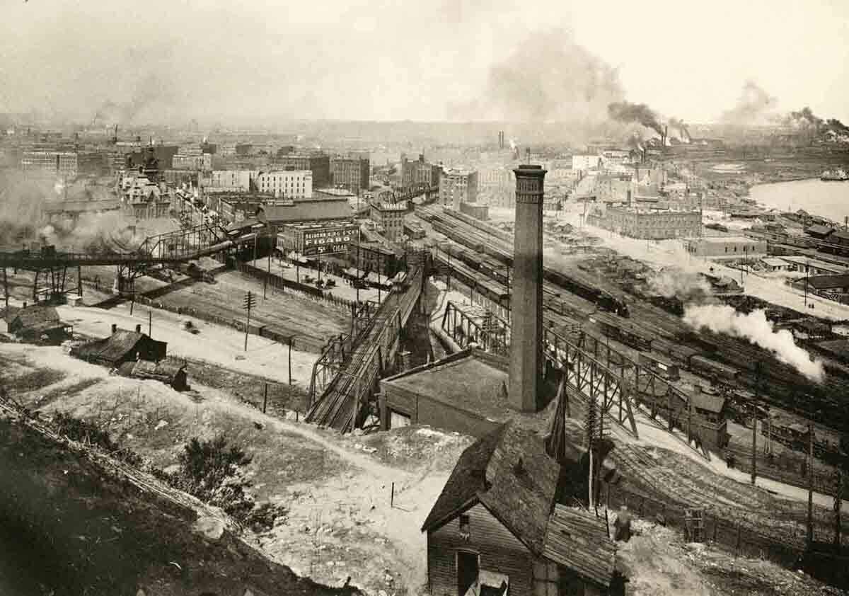 View looking down at the West Bottoms from Quality Hill showing the Ninth Street Incline and Eighth Street tunnel entering the bluffs, 1899.