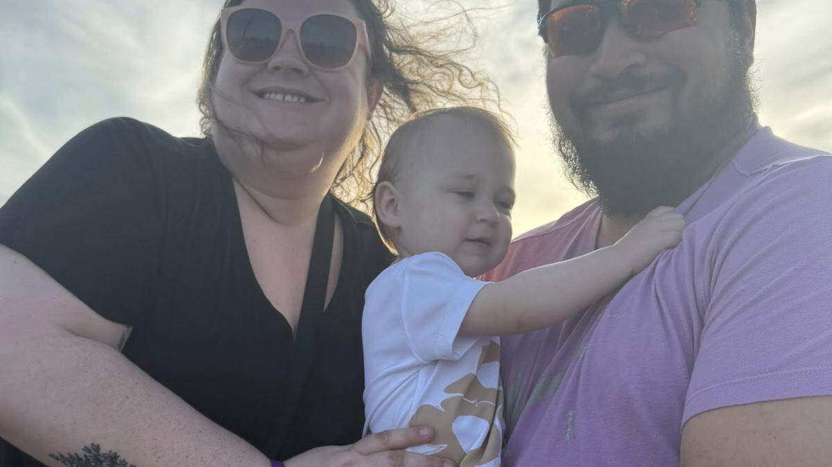 Skylar Biggs Jones with her husband, Dakota Jones, and their 14-month-old daughter, Brinnley, on vacation in Florida. Dakota Jones, of Kansas City, drowned in the water off Panama City Beach on Thursday, May 7, 2026.