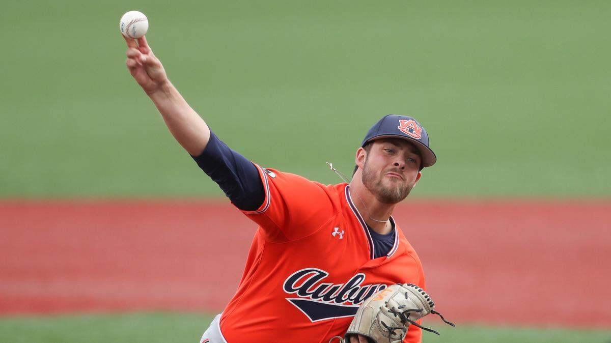 Auburn pitcher Mason Barnett throws against Oregon State during the first inning of an NCAA college baseball tournament super regional game on Monday, June 13, 2022, in Corvallis, Ore. (AP Photo/Amanda Loman)