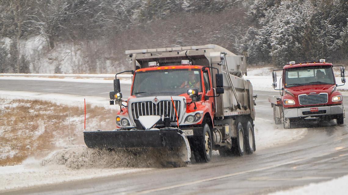 A snowplow clears an entry ramp to eastbound Kansas K-10 Highway on Feb. 12 in Lenexa.