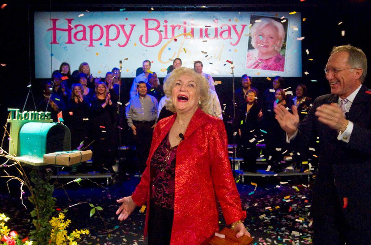 Actress Betty White is delighted as confetti rains down during a surprise birthday party at Crown Center in Kansas City on Jan. 20, 2011. The celebration followed a screening of her Hallmark Hall of Fame movie The Lost Valentine, with Hallmark Hall of Fame Productions president Brad Moore by her side. The event was part of White’s coast-to-coast festivities for her 89th birthday.