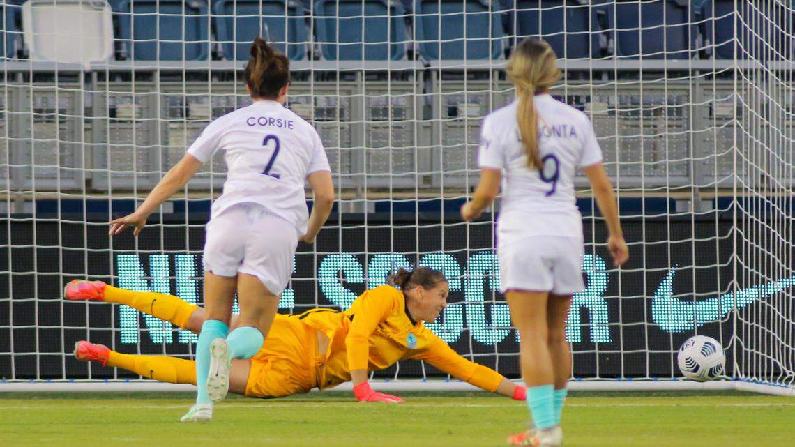 KC NWSL goalkeeper Nicole Barnhart stretches out in vain against a goal by the Houston Dash Monday night at Children’s Mercy Park in Kansas City, Kan.