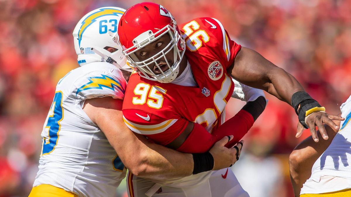 Kansas City Chiefs defensive end Chris Jones (95) attempts to break through the block of Los Angeles Chargers center Corey Linsley (63) during the game between the Kansas City Chiefs and the Los Angeles Chargers on September 26, 2021 at Arrowhead Stadium in Kansas City, Missouri.
