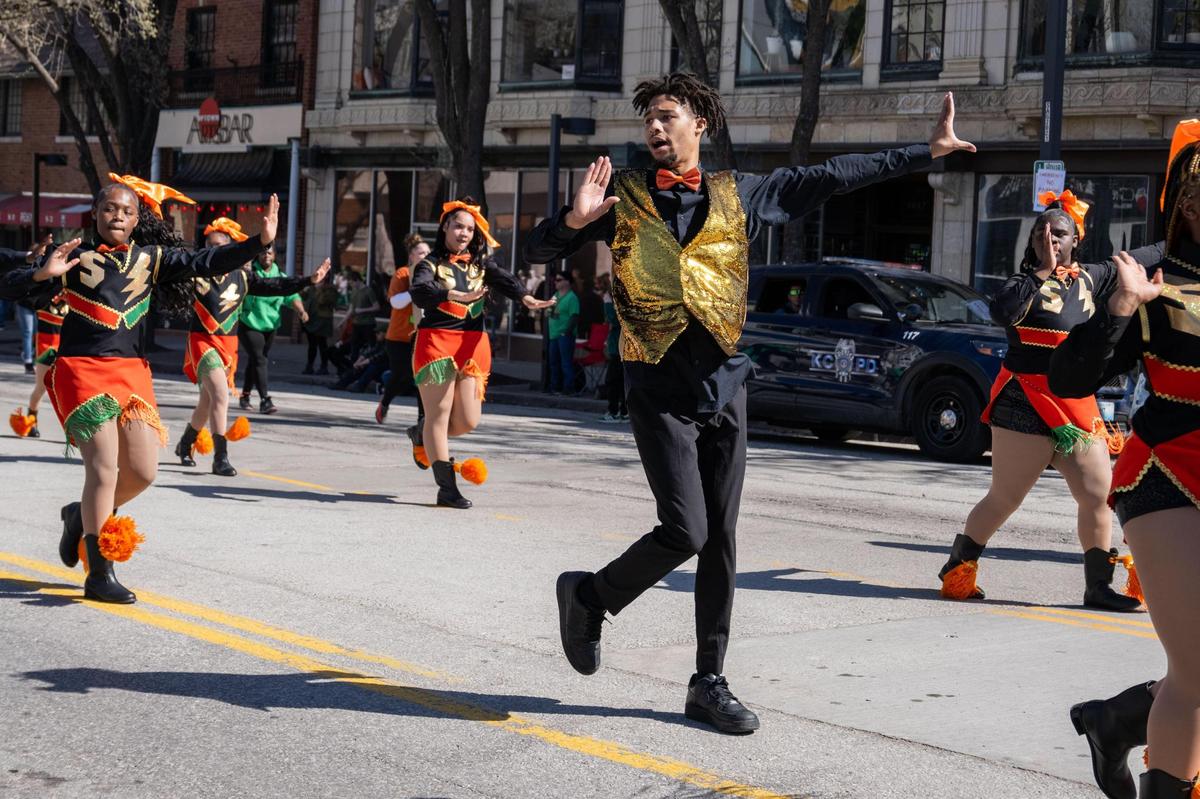The Kansas City Sizzlers drill team dances in the Kansas City St. Patrick’s Day Parade on Monday, March 17, 2025.