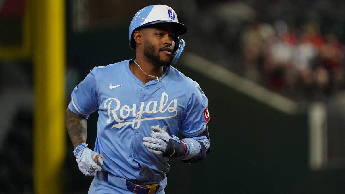 Kansas City Royals third baseman Maikel Garcia (11) reacts towards the dugout as he runs the bases after hitting a three-run home run during the third inning against the Texas Rangers at Globe Life Field on Jun 18, 2025 in Arlington, Texas, USA.