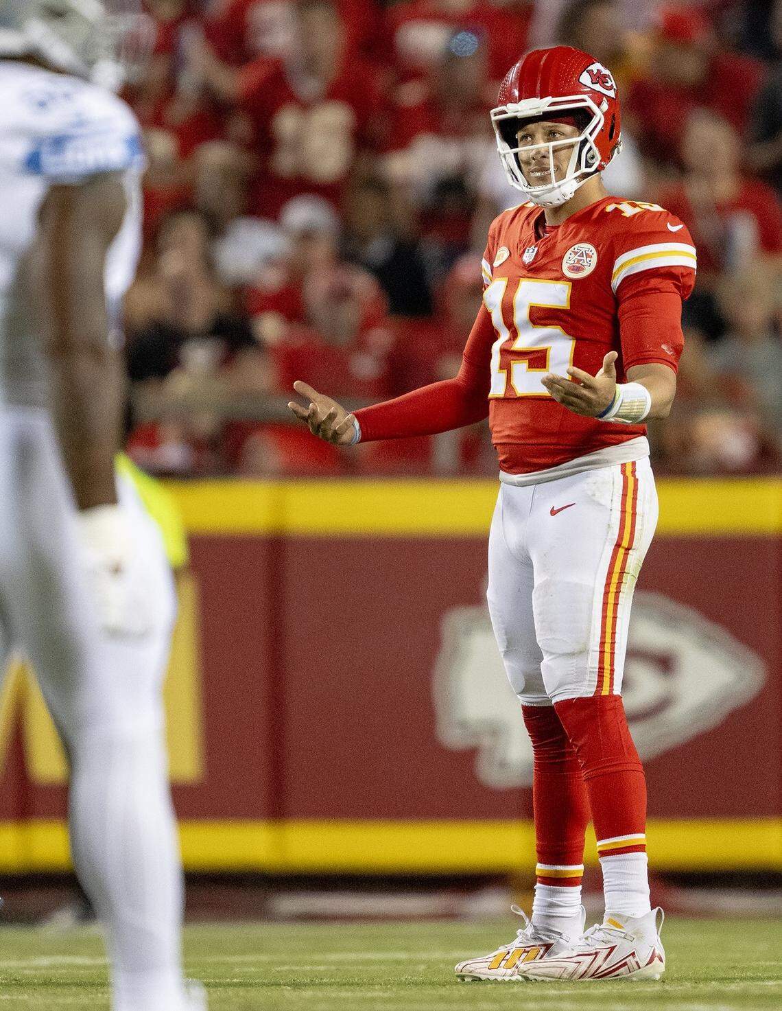 Chiefs quarterback Patrick Mahomes looks downfield after a receiver dropped another pass during Thursday night’s game against the Detroit Lions at GEHA Field at Arrowhead Stadium.