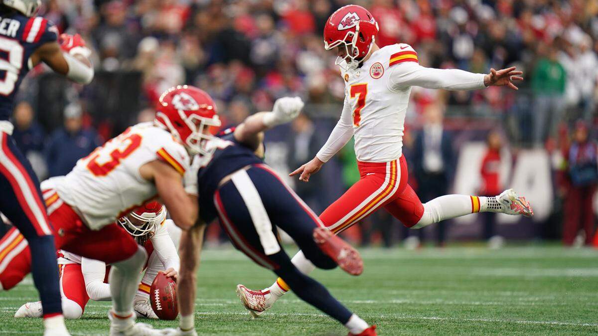 Dec 17, 2023; Foxborough, Massachusetts, USA; Kansas City Chiefs place kicker Harrison Butker (7) kicks the extra point against the New England Patriots in the first quarter at Gillette Stadium. Mandatory Credit: David Butler II-USA TODAY Sports