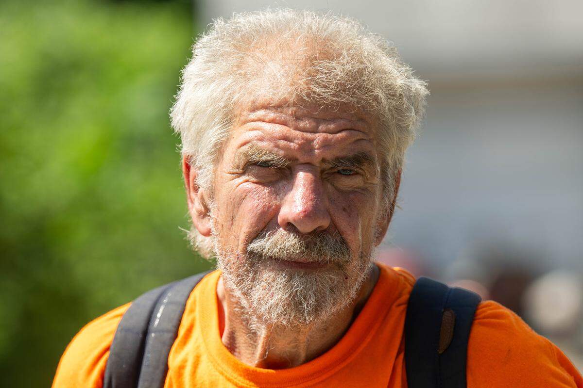 Timothy Friese outside his home, in Kansas City, on Thursday, Sep. 11, 2025. Squatters have transformed most of Timothy Friese's home, interior and exterior, into a homeless encampment and Friese is facing fines of up to $100 a day from the city.