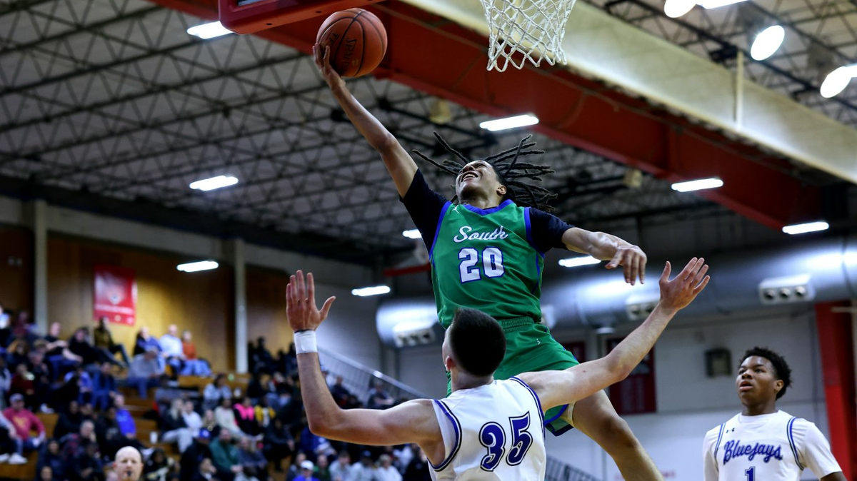 AC Rollins elevates for a layup in Blue Springs South’s 55-50 win over Raytown in the Patterson Division title game at the Jewell Classic on Monday, Dec. 30, 2024.