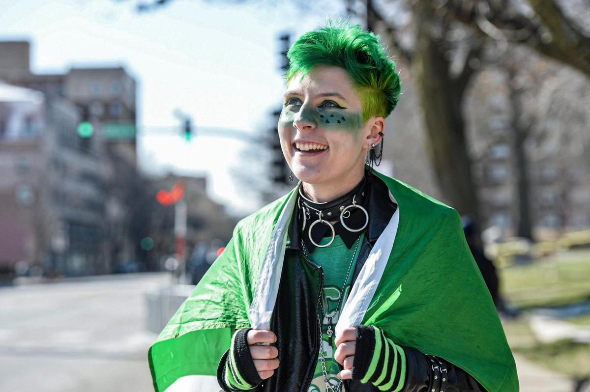 Tori McDonald-Kershaw was decked out in green and other things Friday, March 17, 2023, during the annual St. Patrick’s Day parade in Kansas City.