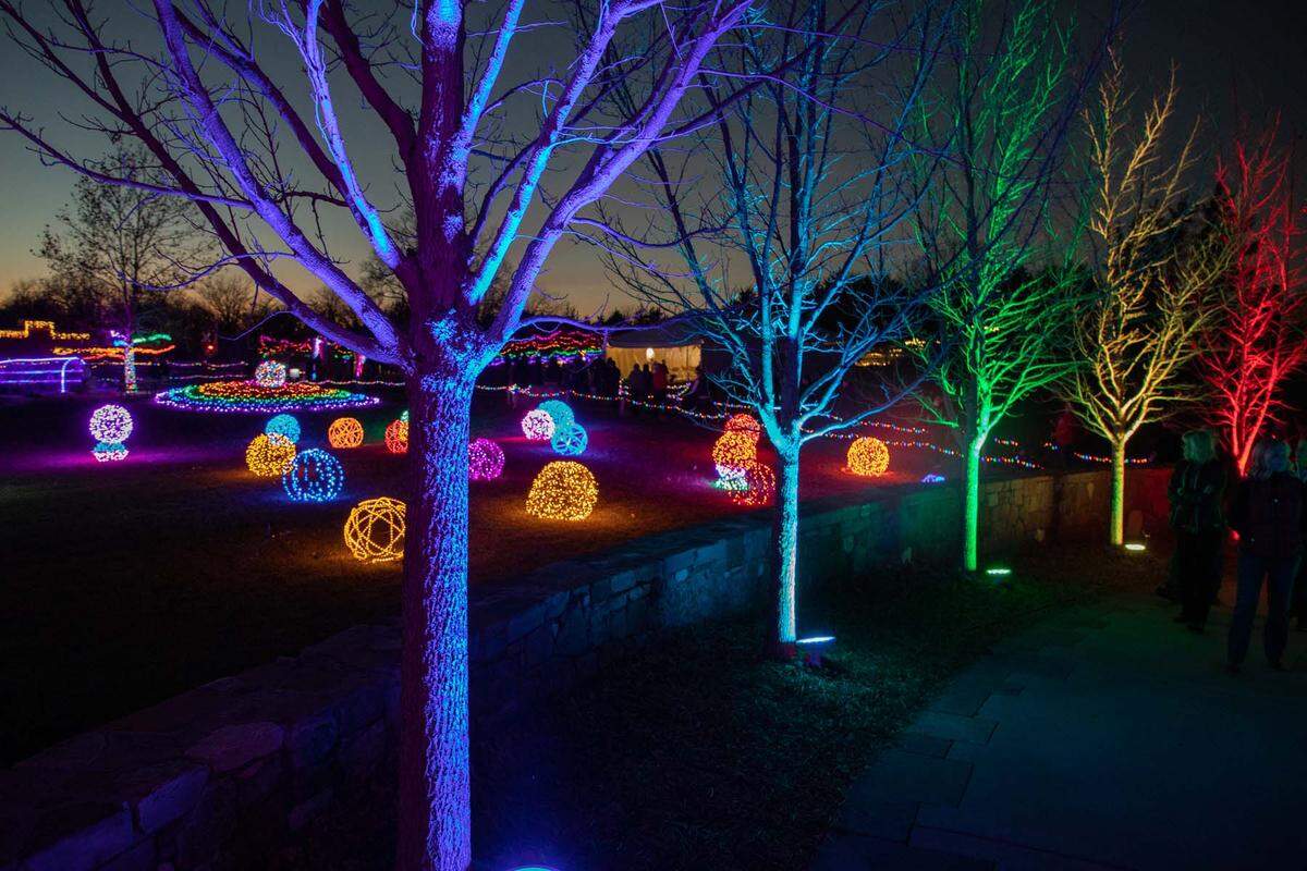 In addition to candlelit pathways, electric lighting is part of the Overland Park Arboretum’s luminary walk.