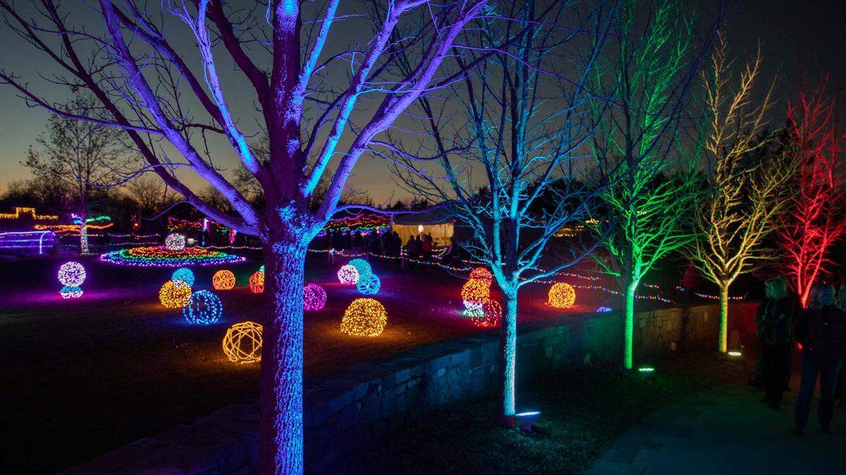 In addition to candlelit pathways, electric lighting is part of the Overland Park Arboretum’s Luminary Walk, an annual holiday tradition that starts Wednesday, Nov. 26.
