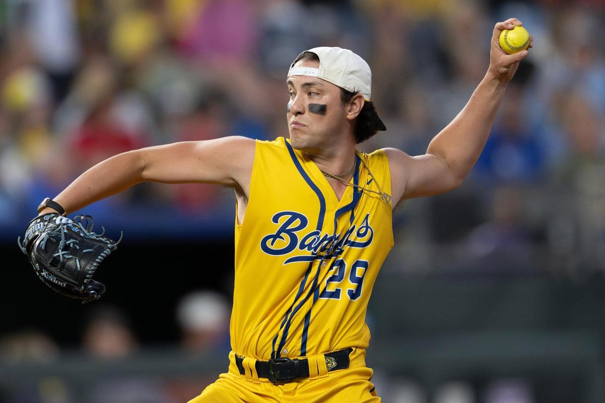 Savannah Bananas pitcher Zack Phillips (29) throws a pitch in the eighth inning during a Banana Ball game against the Firefighters at Kauffman Stadium on Friday, May 23, 2025, in Kansas City.