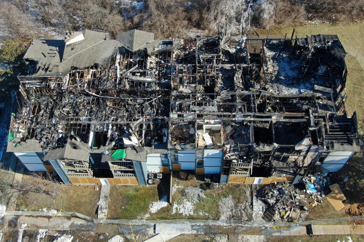 The aftermath of a devastating fire was visible at the Indy Ridge Apartment complex in Independence on Thursday, Jan. 23, 2025. The blaze, which occurred Wednesday, claimed the lives of a family of four, including two children, ages 3 and 8, and their parents.