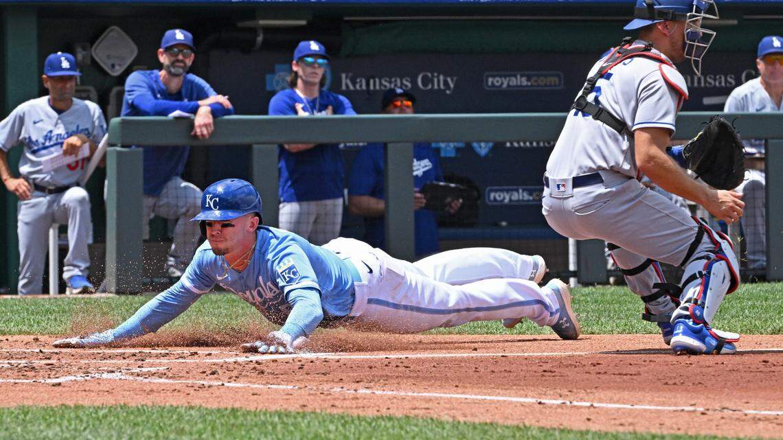 Jul 2, 2023; Kansas City, Missouri, USA; Kansas City Royals right fielder Drew Waters (6) scores a run against Los Angeles Dodgers catcher Austin Barnes (15) in the second inning at Kauffman Stadium. Mandatory Credit: Peter Aiken-USA TODAY Sports