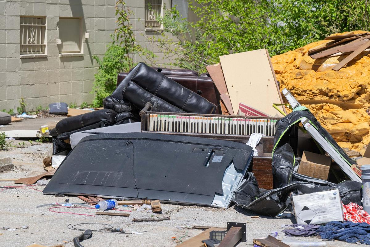 An illegal dump site in the parking lot of a failed housing development in the 2500 block of Michigan Avenue on Tuesday, April 15, 2025.