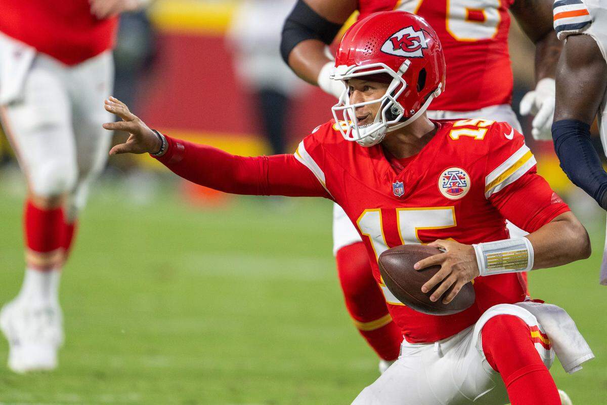 Kansas City Chiefs' Patrick Mahomes (15) gestures as if he wanted to perform a lateral in the first quarter of the Chiefs preseason game vs. the Chicago Bears at GEHA Field at Arrowhead Stadium on Friday, Aug. 22, 2025, in Kansas City.