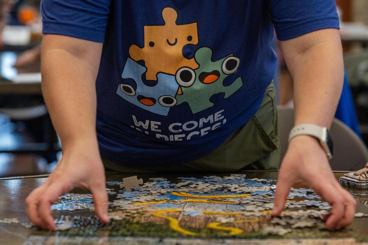 We Come in Pieces sports a themed puzzle shirt during the Puzzle Palooza competition at The Lodge at Ironwoods.