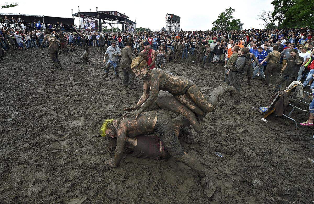 After one of the wettest Mays on record turned the Liberty Memorial grounds into a quagmire, mud wrestling drew music fans’ attention away from the stage during Rockfest on May 30, 2015.