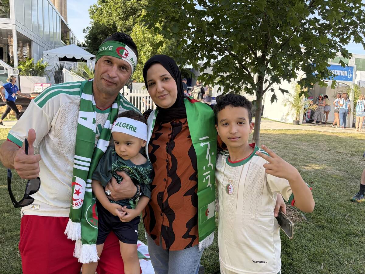 Smail Smahi (left) lives in Olathe with his family, but he was born in Béjaïa, Algeria. His son, 8-year-old son, Abdau (right), had predicted a 3-0 win in favor of Algeria.