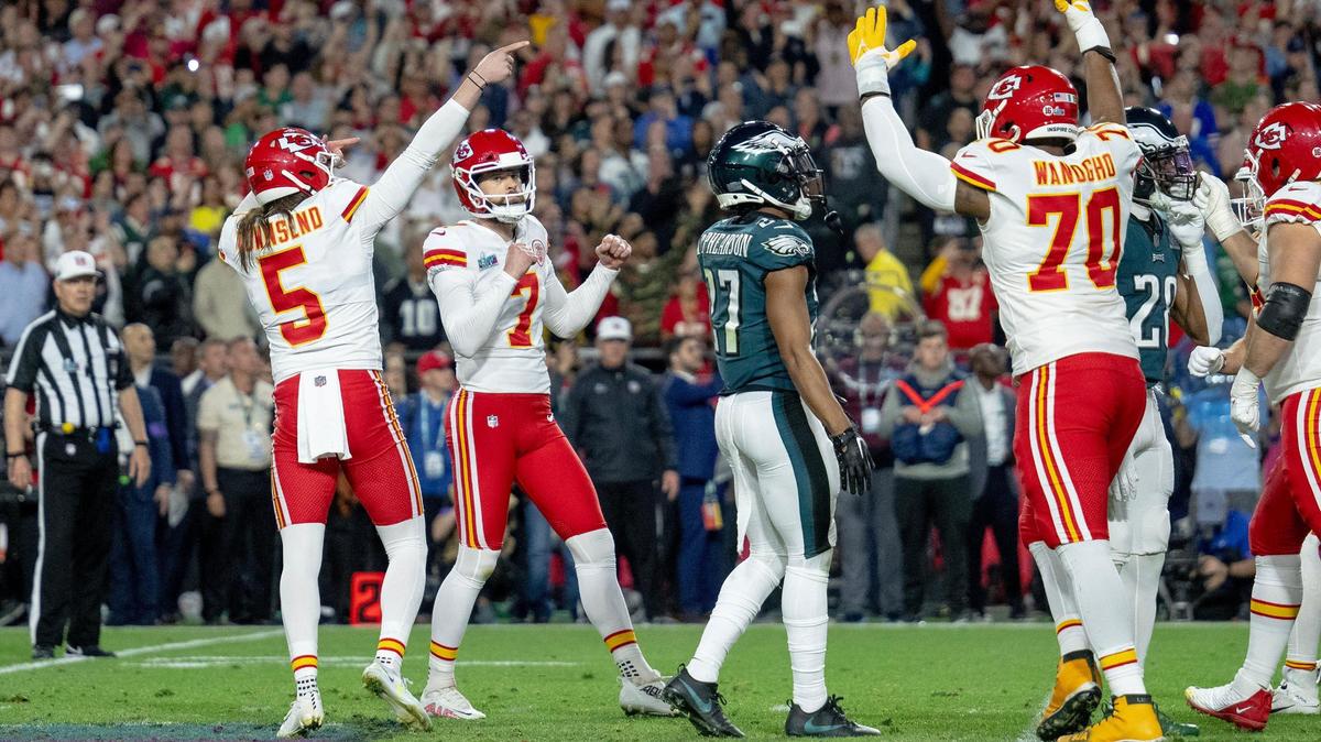 Kansas City Chiefs place kicker Harrison Butker (7) celebrates the go-ahead field goal with punter Tommy Townsend (5) during the Super Bowl LVII football game against the Philadelphia Eagles on Sunday, Feb. 12, 2023, in Glendale, Ariz.