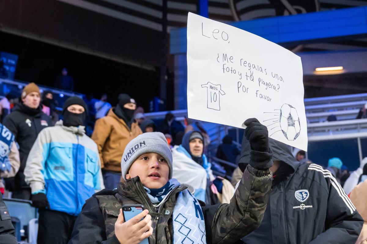 A young Messi fan holds up a sign after the Concacaf Champions Cup match of Sporting KC vs. Inter Miami CF on Wednesday, Feb. 19, 2025, at Sporting Park.