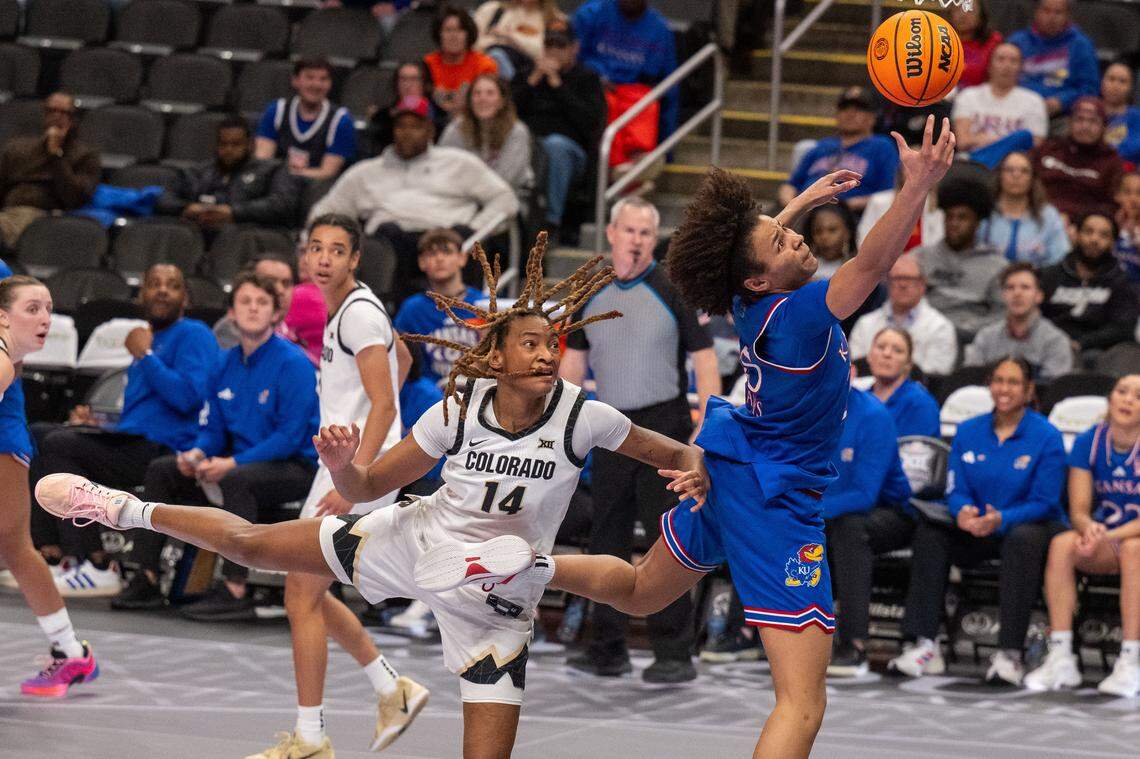 Kansas Jayhawks forward Jaliya Davis (25) reaches for an errant pass in the second half of KU’s second-round game at the Big 12 Women's Basketball Tournament on Thursday, March 5, 2026, at T-Mobile Center in Kansas City.