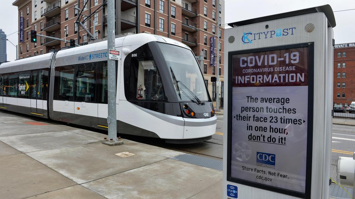 An electronic kiosk near one of the KC Streetcar stops warns of the COVID-19 dangers. Masks are no longer required on Kansas City public transportation after a federal judge the TSA’s national mandate Monday.