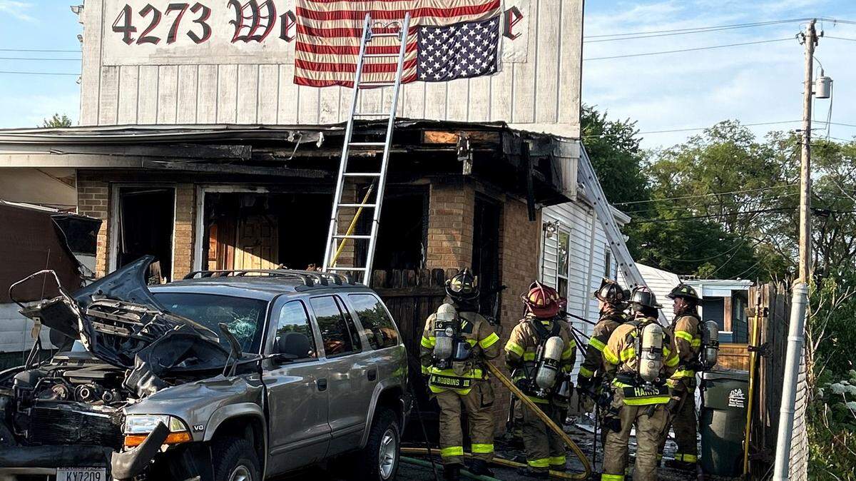 A fire at a tattoo shop in Madison, Wisconsin, is believed to have been intentionally started by the owner, who died minutes later in a crash, cops say.