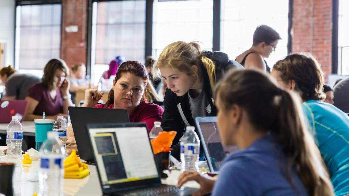 Women learn computer programming at the Kansas City Women in Technology Django Girls event at the Sprint Accelerator in 2017.