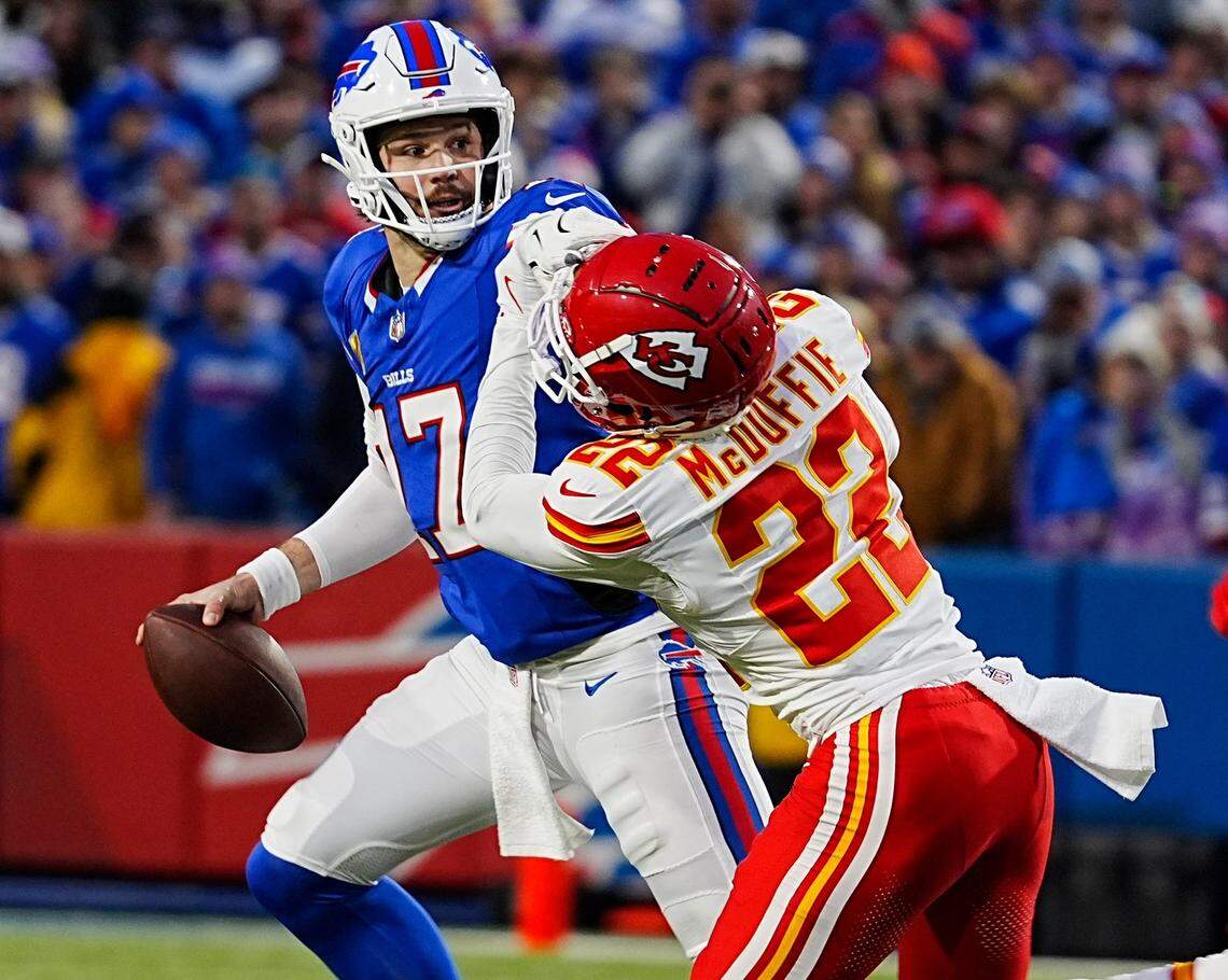 Buffalo Bills quarterback Josh Allen stiff-arms Kansas City Chiefs cornerback Trent McDuffie during a Sunday, Nov. 17, 2024 NFL Week 11 game at Highmark Stadium in Orchard Park, New York.
