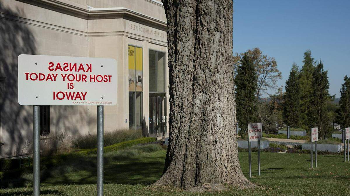 “Native Hosts” by Hock E Aye Vi Edgar Heap of Birds outside the Spencer Museum of Art