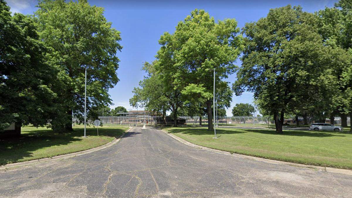 A former employee at the Kansas Juvenile Correctional Complex in Topeka has been charged with having unlawful sexual relations with a young woman held at the facility.