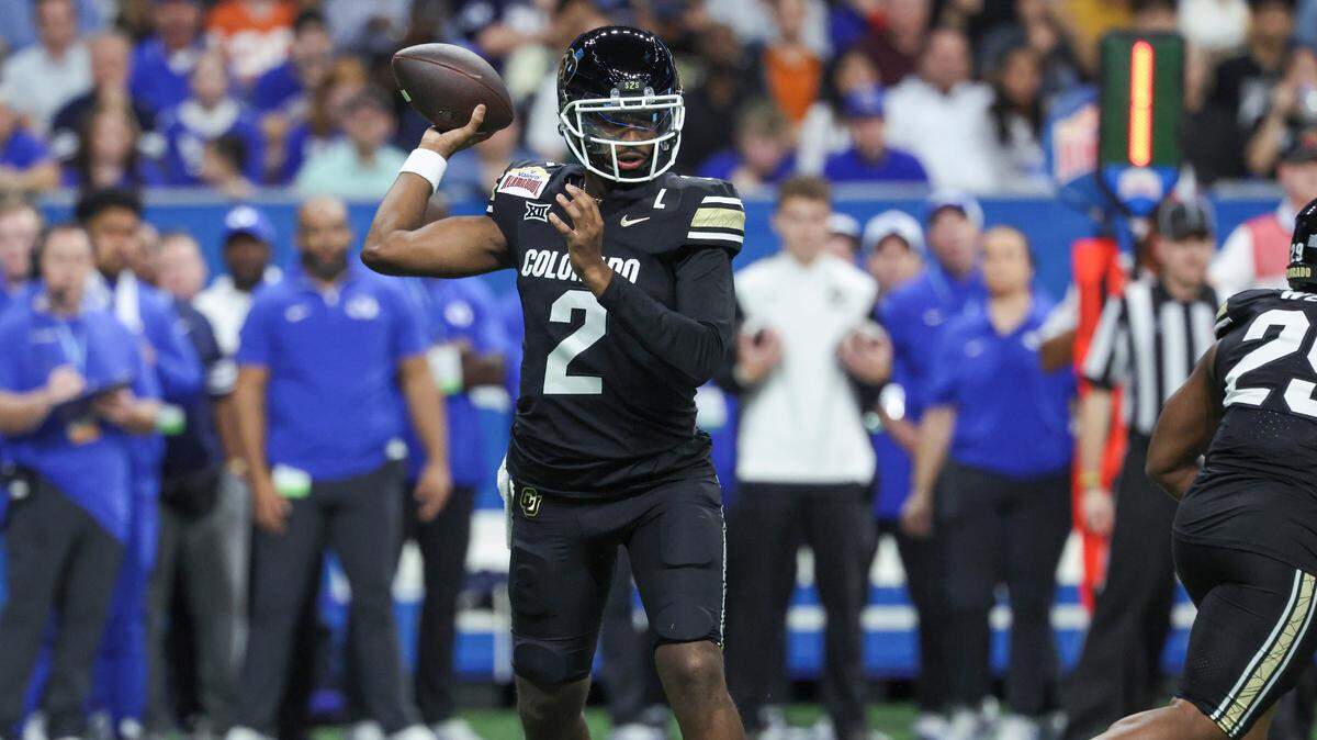 Colorado Buffaloes quarterback Shedeur Sanders (2) attempts a pass during the first quarter against the Brigham Young Cougars at Alamodome.