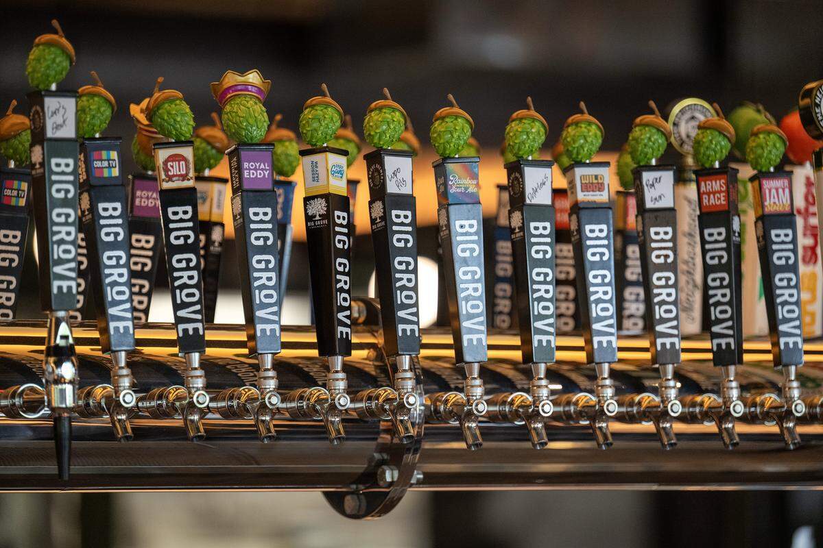 Tap handles representing a wide variety of beers stand ready for the opening of Big Grove Brewery in Prairie Village on Thursday, May 14, 2026. The 12,000-square-foot taproom and restaurant, located in the former Macy's building at 7060 Mission Rd., features an extensive selection of the Iowa-based brewery's craft beers. It will open on May 21, 2026.