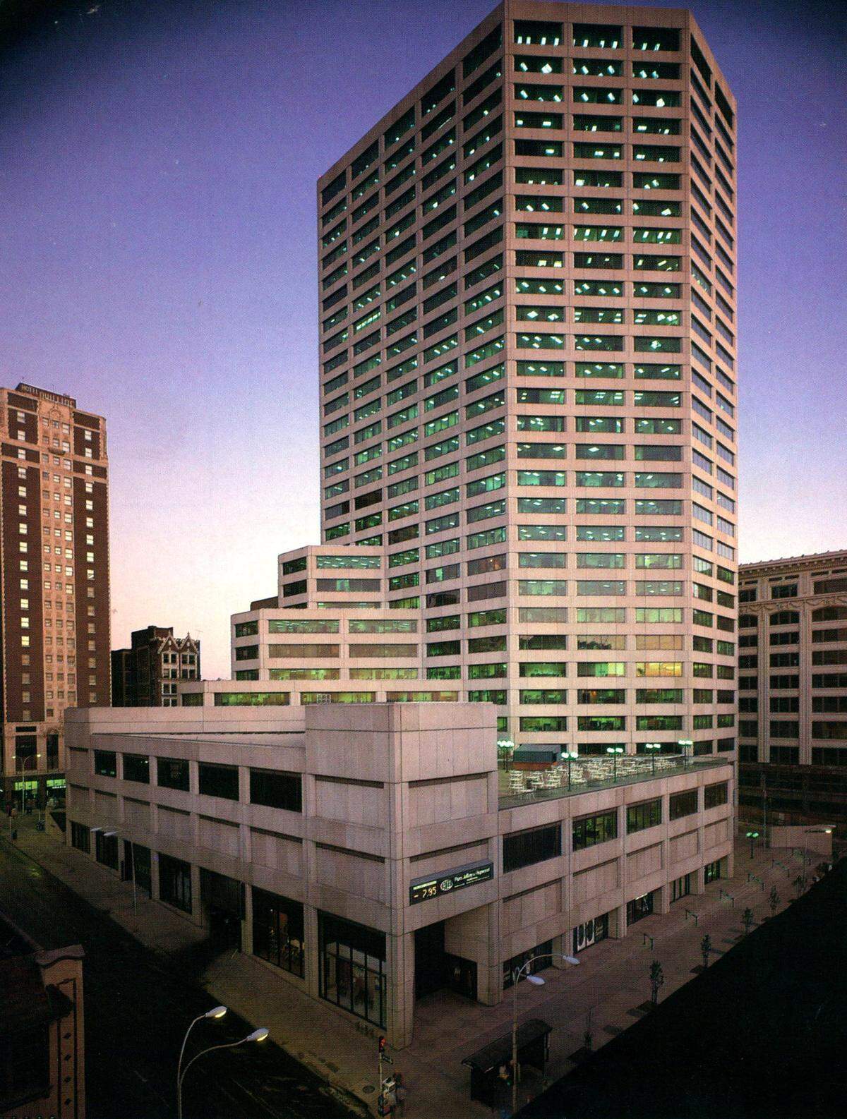The Lightwell Building, formerly known as City Center Square, was completed in the spring of 1977. The skyscraper takes up the entire block of 11th to 12th Street and Main to Baltimore.