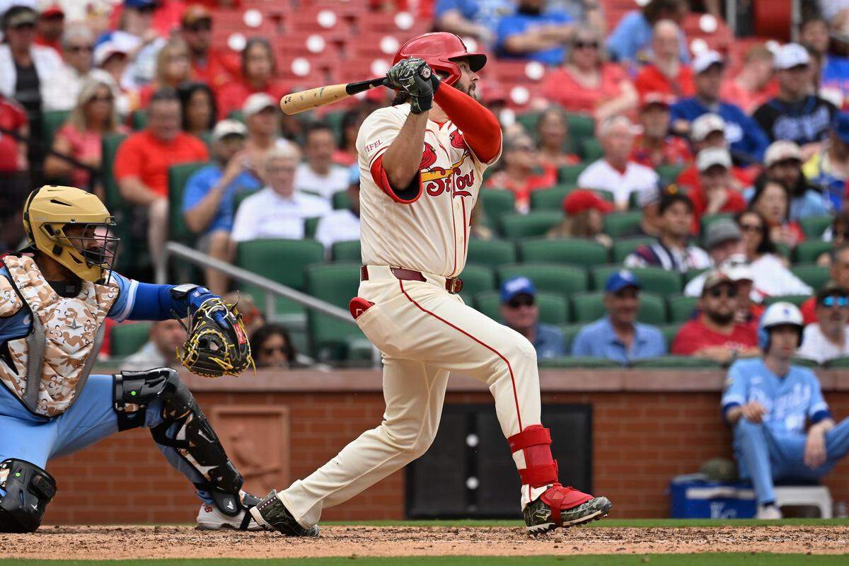 Cardinals first baseman Alec Burleson singles to drive in a run during the eighth inning of a game against the Royals at Busch Stadium in St. Louis on Saturday, May 16, 2026.