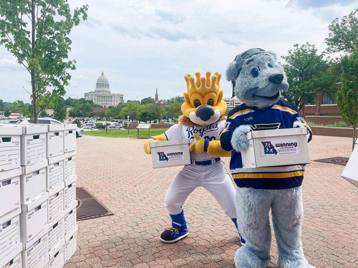 Kansas City Royals mascot Sluggerrr, left, and St. Louis Blues mascot Louie posed for a photo op for the delivery of signatures to Jefferson City to place sports betting on an upcoming Missouri ballot.