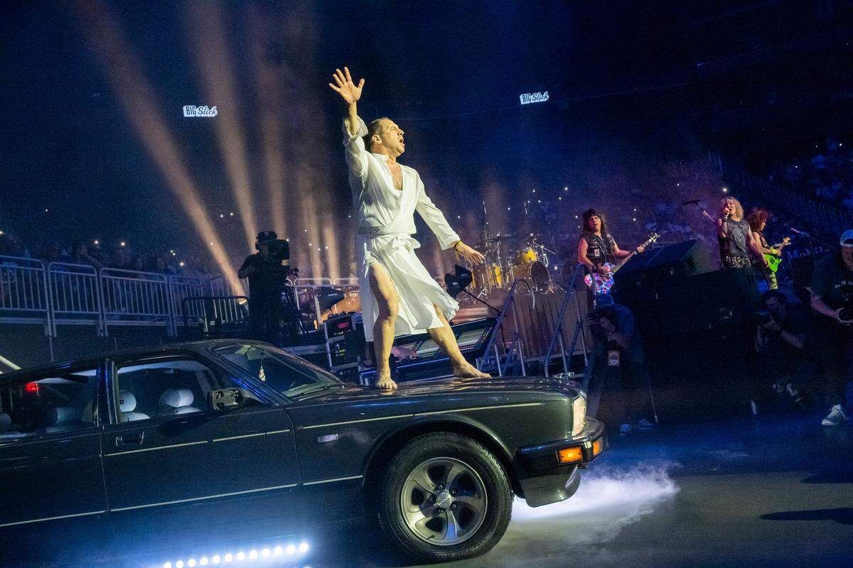 Comedian Seth Herzog dances on a car at the Big Slick fundraiser on Saturday, May 30, at T-Mobile Center. The annual fundraiser put on by famous Kansas City celebrities raises money for Children’s Mercy Hospital.