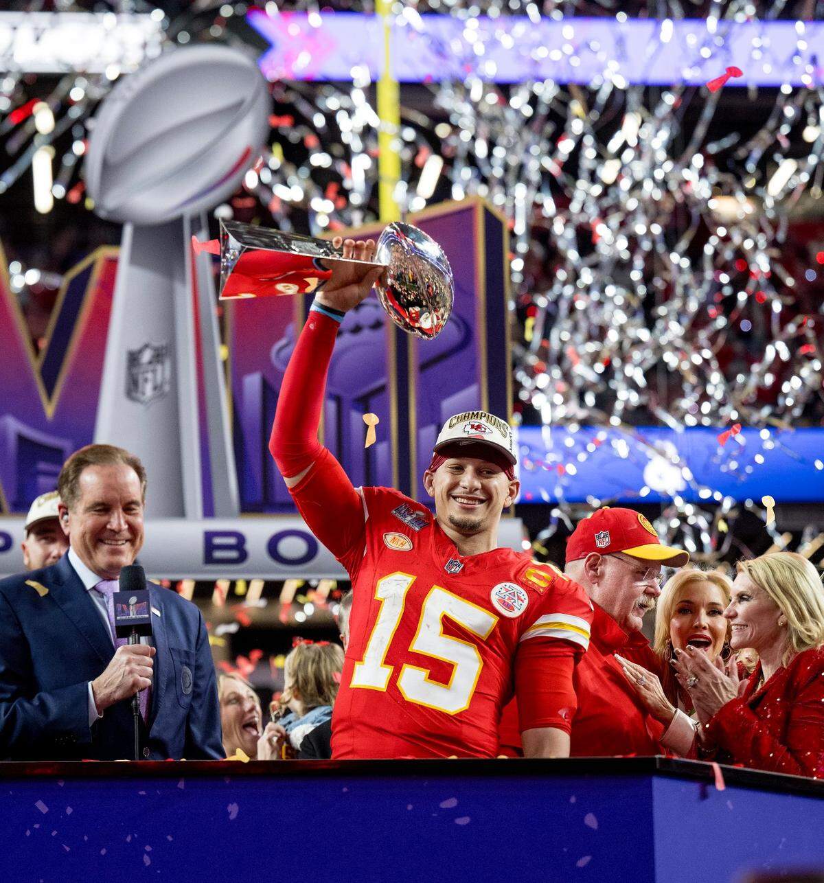 Kansas City Chiefs quarterback Patrick Mahomes (15) hoists the Lombardi Trophy after the Chiefs defeated the San Francisco 49ers in overtime 25-22 in Super Bowl LVIII on Sunday, Feb. 11, 2024, in Las Vegas.