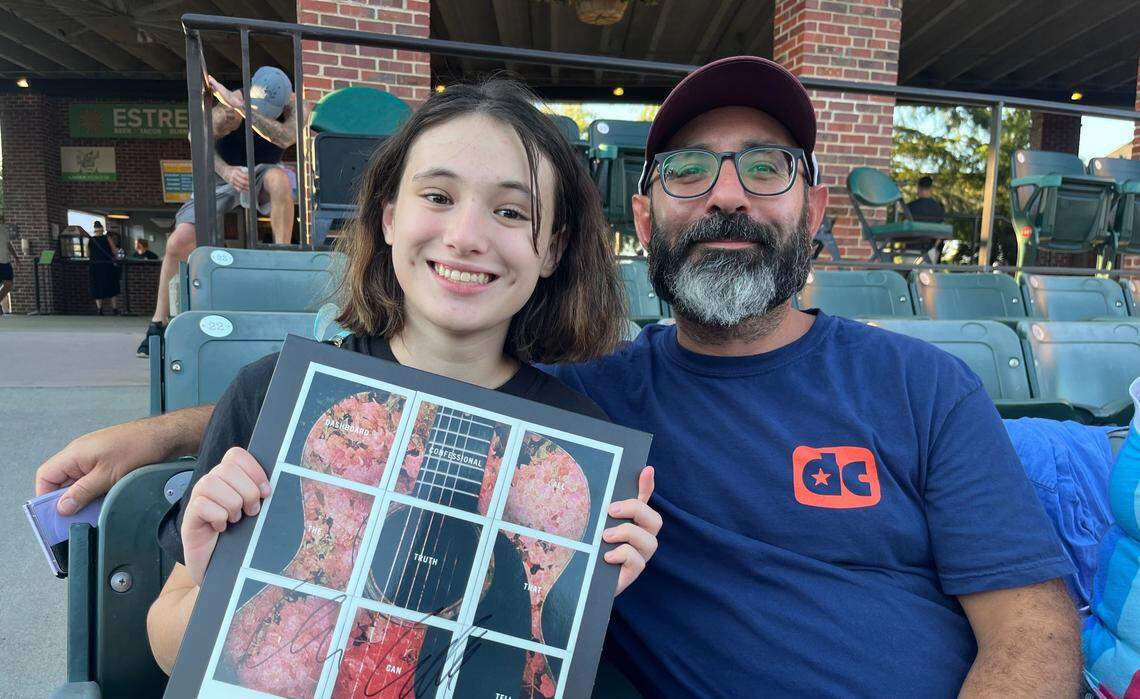 14-year-old Elia Reed and her father, Ryan, are from Springfield, Missouri. They traveled Friday, Aug. 22 to Kansas City to see Dashboard Confessional for the second time in 2025.
