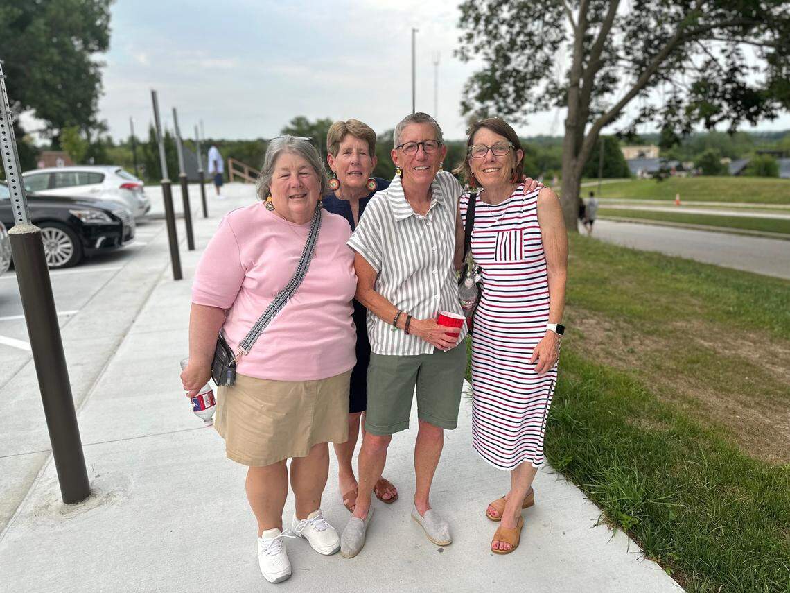 Sue Scott, left, came to Kansas City from Cleveland, Ohio, to watch Earth, Wind, and Fire at Starlight Theater on Friday. Her friends include Kathy Barsness, middle left, Molly Whaley, middle right, and Martha Hemer, right. They all wore custom earrings dedicated to albums the band made.