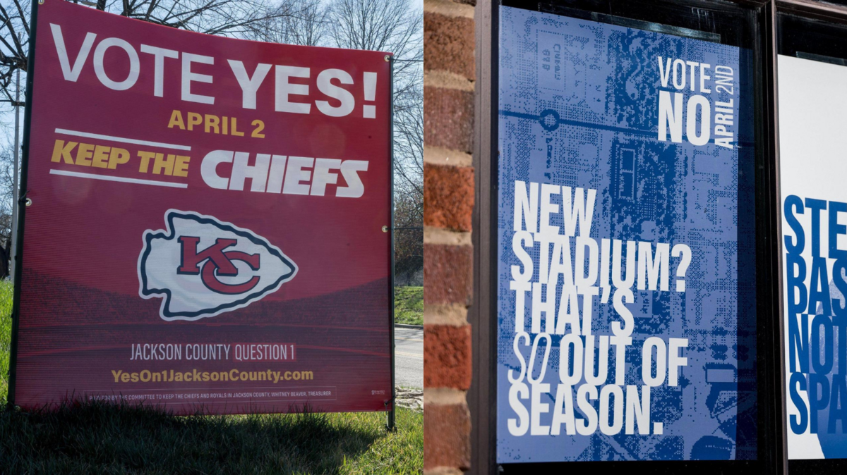 A yard sign and a window sign in Kansas City take opposing stances on the stadium tax issue that’s on the ballot in Jackson County in the April 2 election.