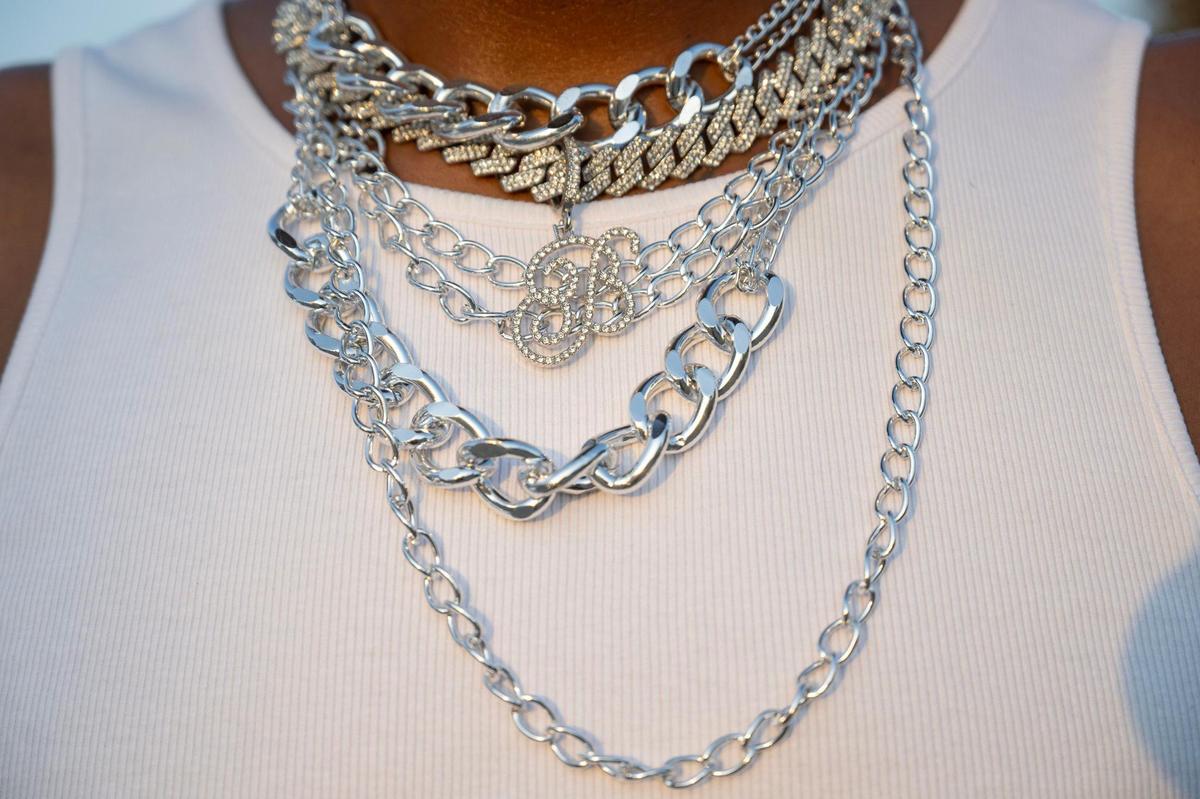 Melvin Buck-Cooper, from Washington D.C., shows off his silver chains before attending the last stop of Beyoncé’s Renaissance World Tour at GEHA Field at Arrowhead Stadium on Sunday, Oct. 1, 2023, in Kansas City.
