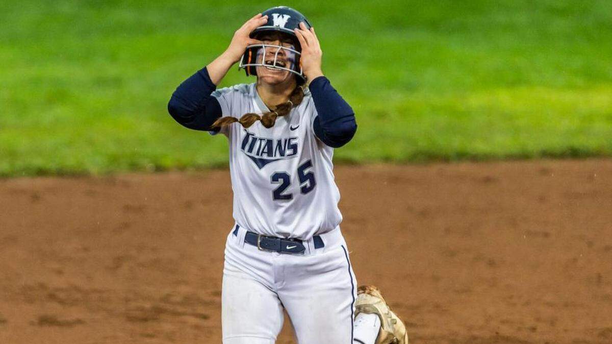 Lee’s Summit West’s Katerina Wilds reacts after tying Friday’s Missouri Class 5 high school championship softball game against Francis Howell 5-5 at the Killian Softball Complex in Springfield.